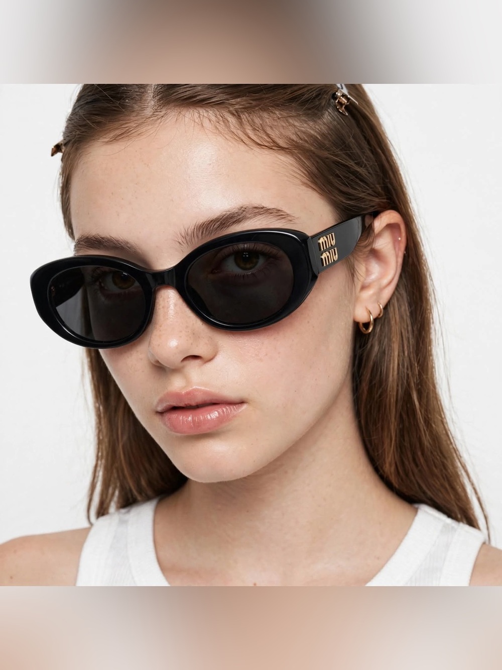 Miu Miu Black Oval Sunglasses with Gold Accent - Picture 6 of 7